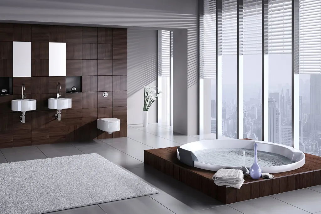 Baño con bañera y vistas a la ciudad